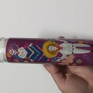 Hand poured white candles from Mexico Halloween themed. 8 inches tall.